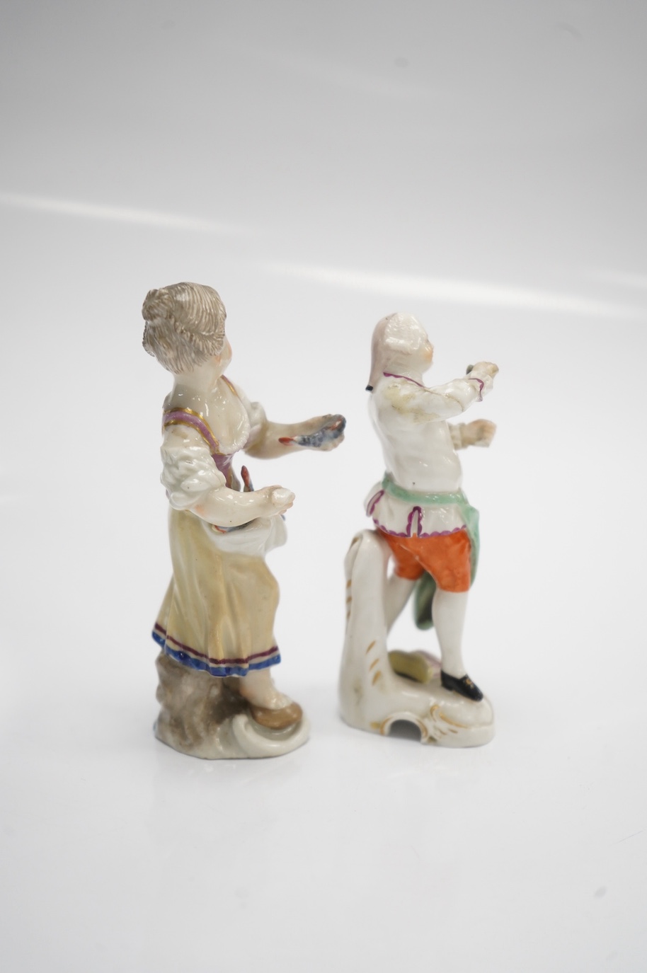 Two 19th century German porcelain figures, Hochst and Buen Retiro style marks, 9.5cm. Condition - fair